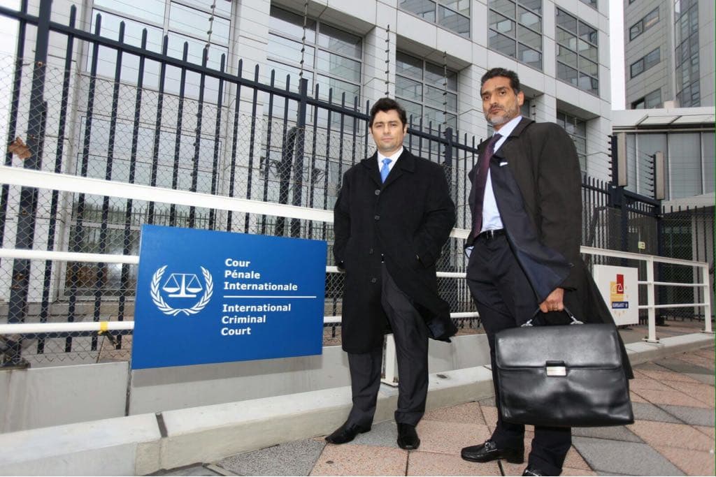 Opposition leader Carlos Vecchio of the Popular Will party with lawyer Juan Carlos Gutierrez outside the ICC in The Hague in November 2015 after presenting a case of crimes of humanity against the Venezuelan government.