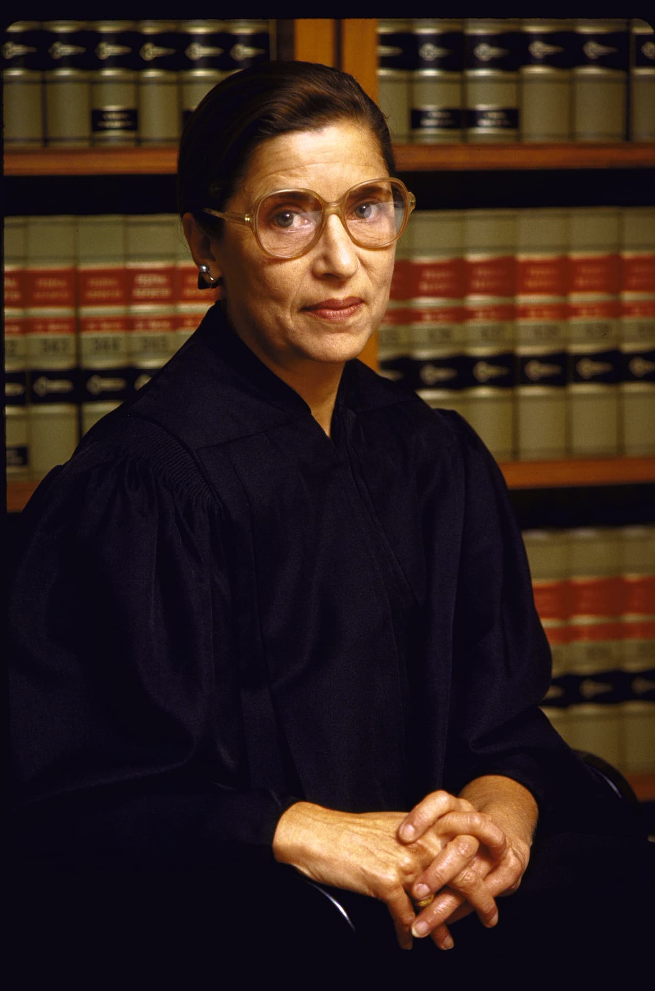 En 1956 Bader se matriculó en la escuela de leyes de Harvard donde era una de las pocas mujeres de entre más de 500 alumnos. Cuando su esposo tomó un trabajo en la ciudad de Nueva York se cambió a la Facultad de Derecho de Columbia y se convirtió en la primera mujer en estar en dos grandes publicaciones legales académicas, la Harvard Law Review y Columbia Law Review. En 1959 completó el doctorado en Leyes en Columbia como primera de su clase. Esta fotografía de la magistrada fue tomada en 1984.