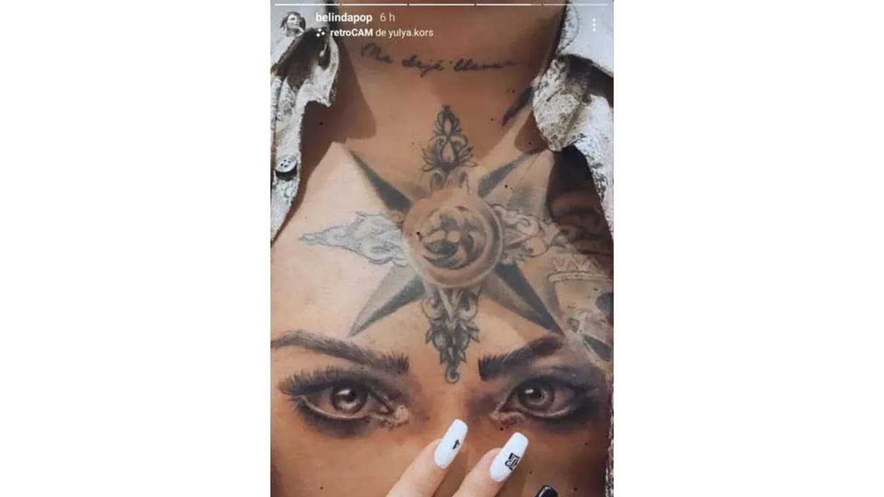 El 'tattoo' más popular son los ojos de Belinda en el pecho de su futuro esposo, un diseño que se encuentra debajo de una rosa de los vientos.