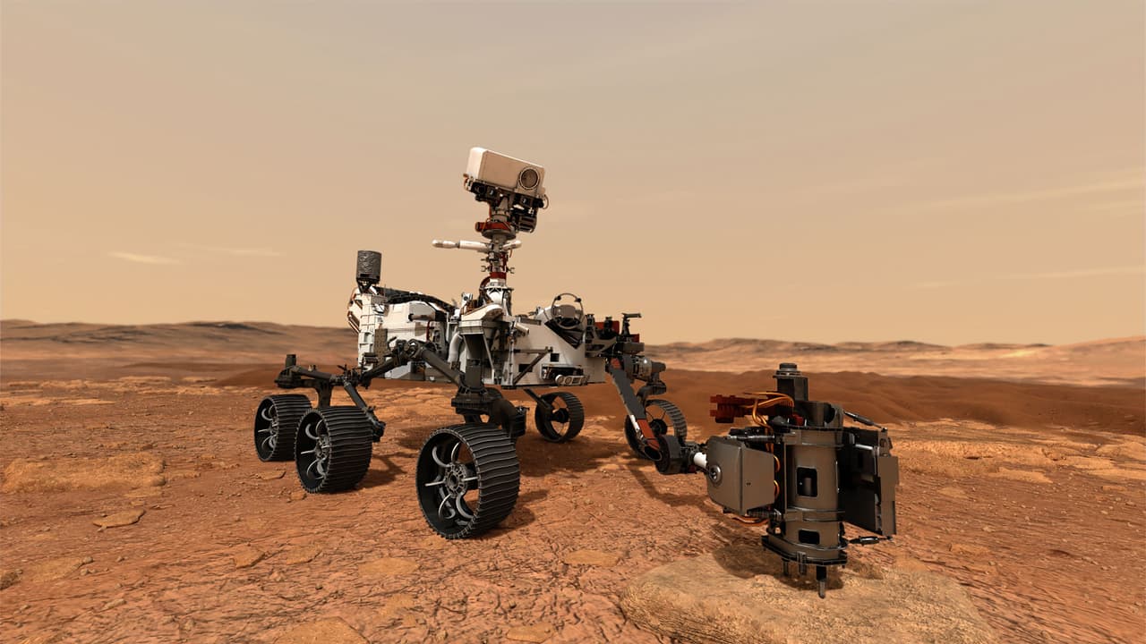 Un concepto artístico publicado por NASA de la sonda Perseverance (perseverancia, en español) durante la recolección de muestras. La misión de este vehículo, también llamado Mars 2020, es buscar rastros de microbios que pueden haber poblado el lugar hace más de 3,000 millones de años.