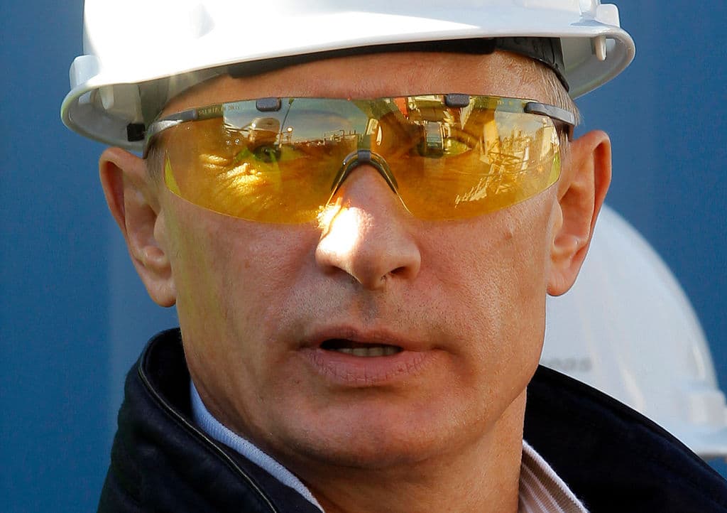 Russian Prime minister Vladimir Putin looks on as he visits the Solitaire ship in Finnish gulf, 200 km (125 miles) west of St.Petersburg, on September 20, 2010.
