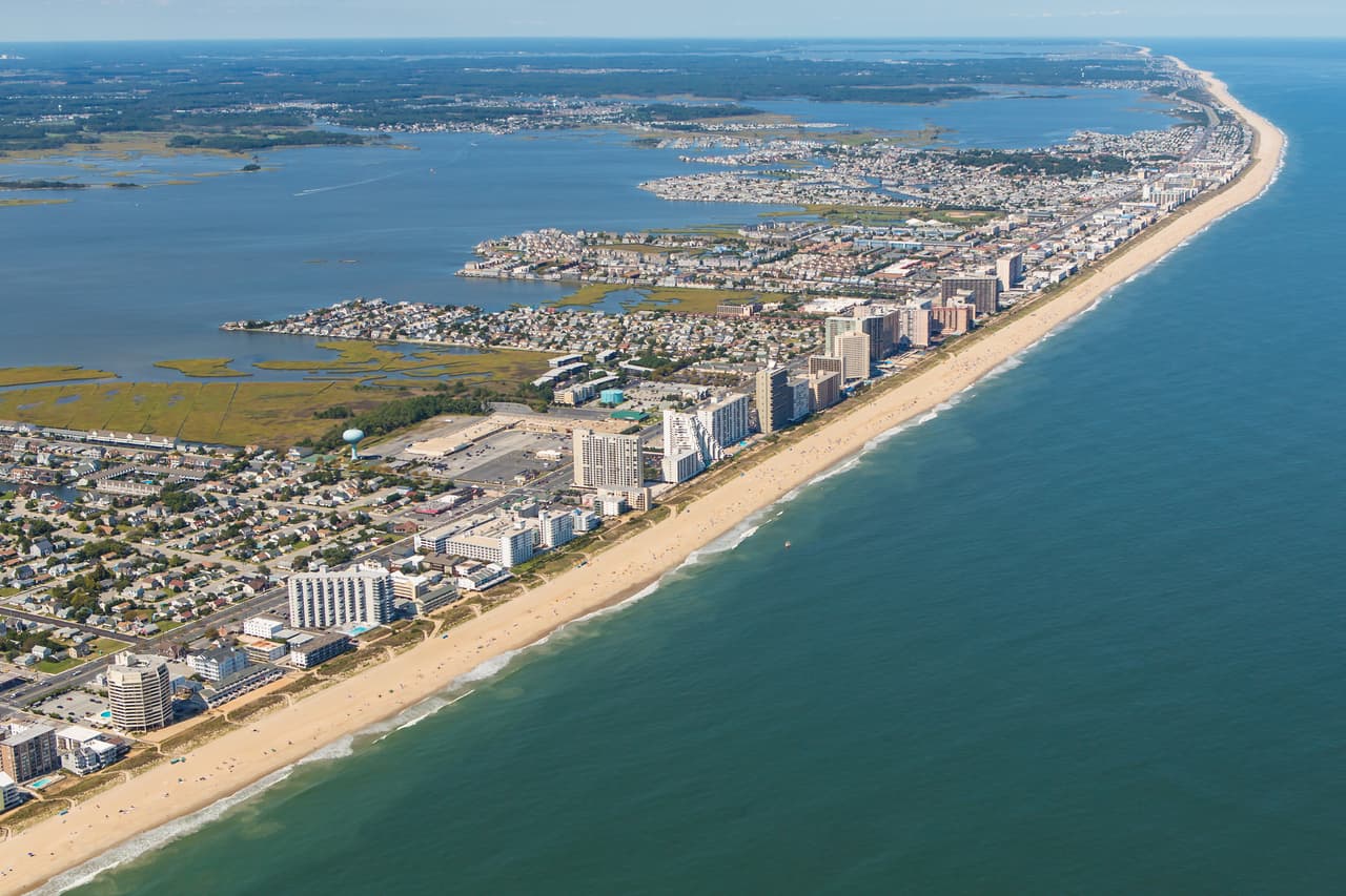 <b>Puesto 13. Ocean City Beach. Ocean City, Maryland</b>.
<br>
<br>"10 millas de arena... esperando para la diversión familiar. Y a diferencia de otras playas, ¡la nuestra es absolutamente gratis!", promociona el sitio de Turismo de Ocean City Beach.
