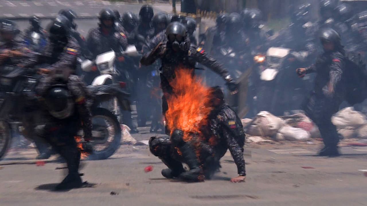 Members of the police patrol got off the bikes to help their comrades and fired shotgun pellets and tear gas to keep journalists away.