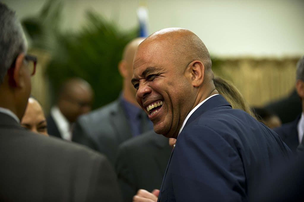El presidente Michel Martelly asiste a una reunión de una comisión asesora el 9 de diciembre de 2014 en Puerto Príncipe.