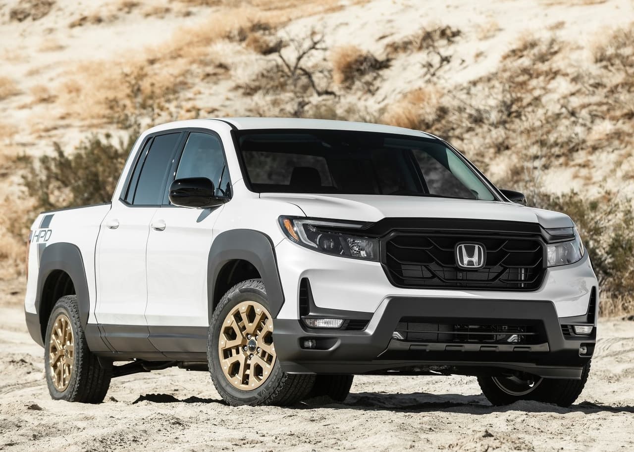 <h3 class="cms-H3-H3"><b>6. Honda Ridgeline</b></h3>
<br>
<br>La Honda Ridgeline actualmente es fabricada en Lincoln, Alabama. Comparado al ranking del año pasado, esta pickup monocuerpo mantiene la misma posición 6. Su precio inicial es de $36,490.
<br>