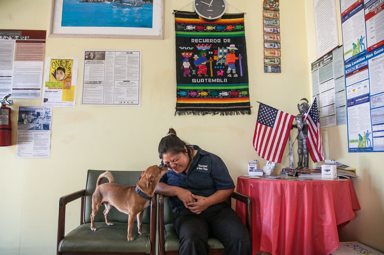 Víctor Chávez and Maty Muy met years later at a church in Providence, Rhode Island, where he had gone to seek better work opportunities. That was Muy's first stop in the United States. In the photo, Maty with the family dog, Sparky.