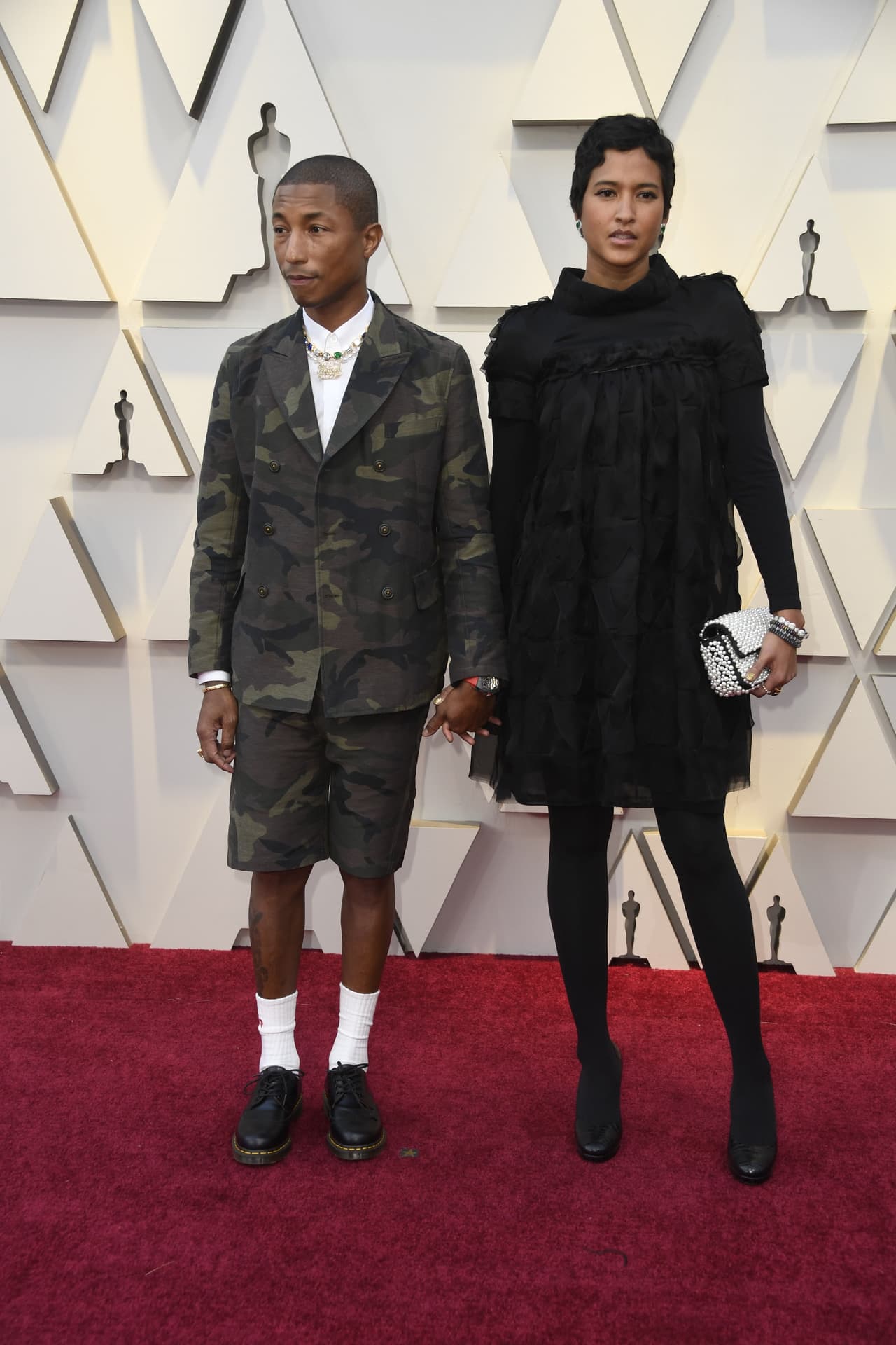 <b>Lo peor: </b>El look de boyscout de William Farrell, con chaqueta y shorts camuflaje y calcetines cortos blancos.