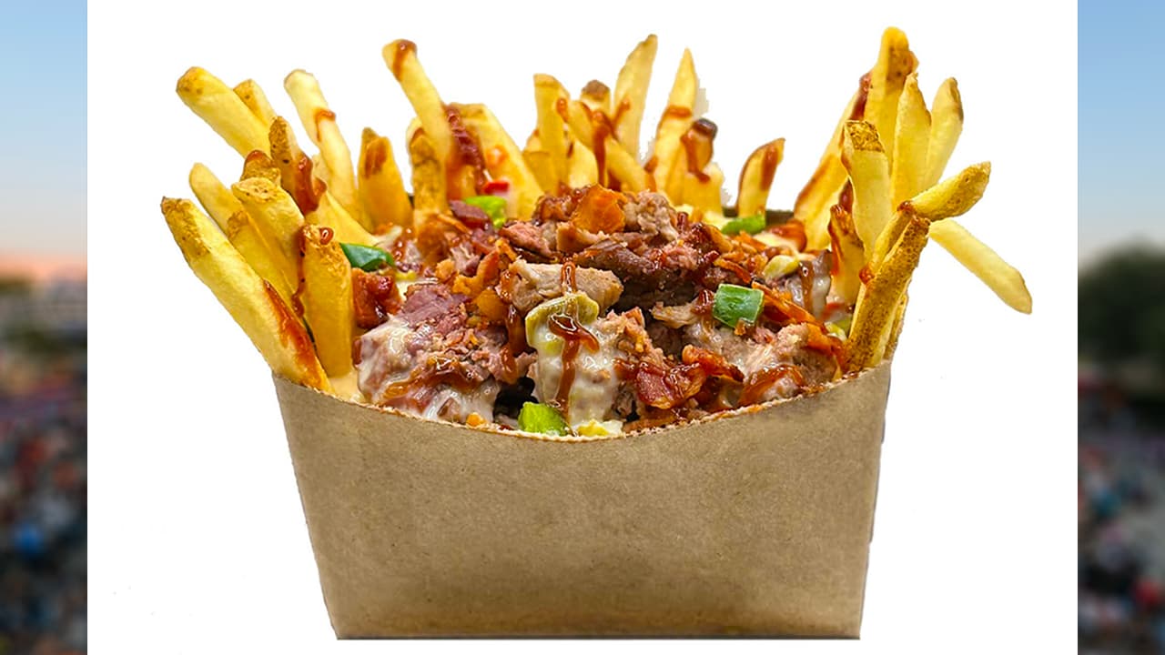 <b>BIG TEXAN</b> de Fryed 
<br>Deliciosas papas fritas y 
<b>crujientes cubiertas de ¡dos salsas!</b> De queso y barbacoa, con trozos de tocineta y panza ahumada.