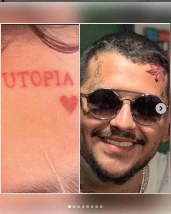 Los pétalos tienen tonalidades rojas. Aunque tapó la palabra 'Utopía', conservó el corazón, pero ahora luce negro.
<br>