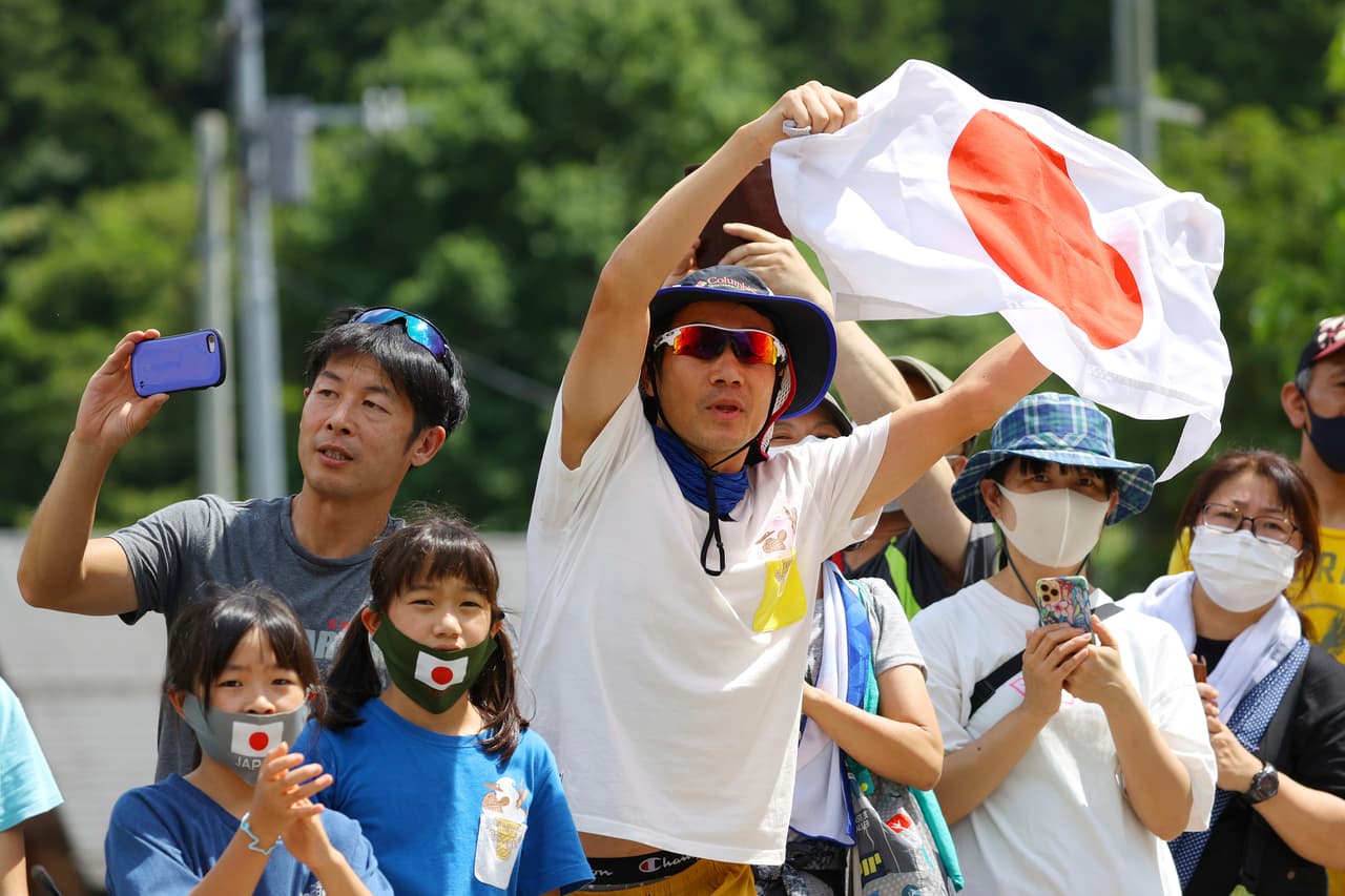 Aficionados durante una carrera de atletismo al aire libre en los Juegos Olímpicos de Tokio. Las medidas tomadas por los organizadores de los JJOO para evitar la propagación de covid-19 también han impedido que los fanáticos tengan la oportunidad única en la vida de ver a la mayoría de los mejores atletas del mundo actuar en su tierra.