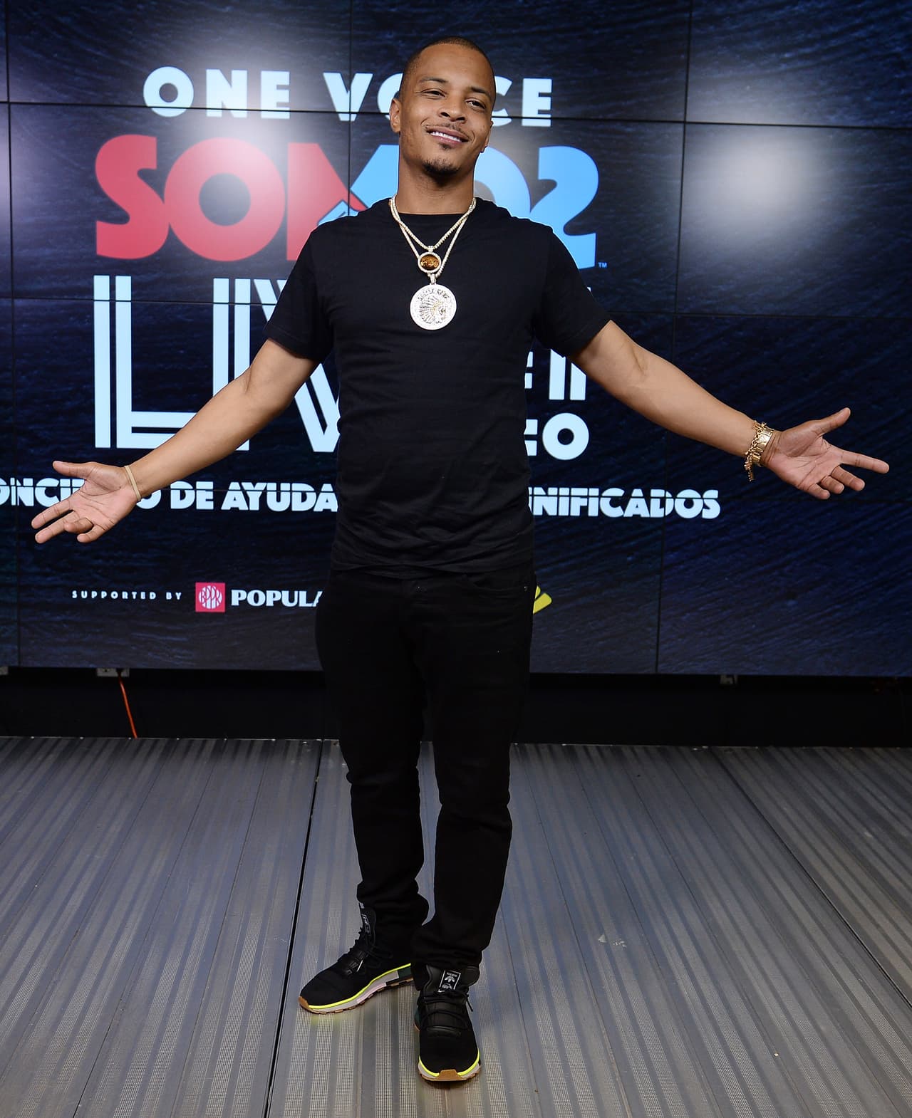 MIAMI, FL - OCTOBER 14: In this handout photo provided by One Voice: Somos Live!, T.I. poses in the pressroom at One Voice: Somos Live! A Concert For Disaster Relief at Marlins Park on October 14, 2017 in Miami, Florida. (Photo by Jason Koerner/One Voice: Somos Live!/Getty Images)