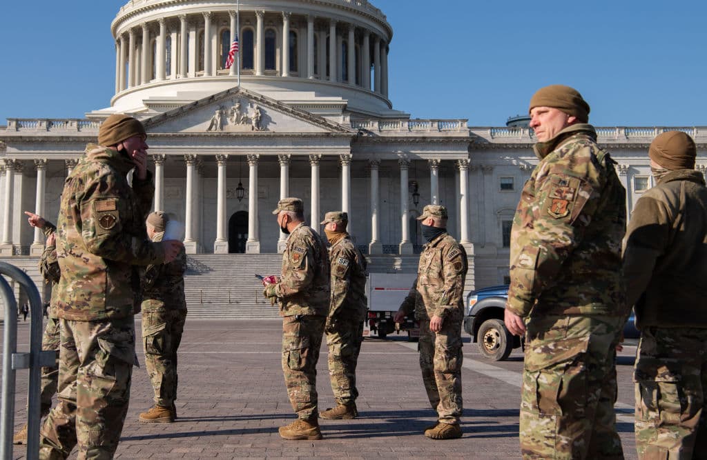 Members of the National Guard patrol outside of the US Capitol in Washington, DC, January 12, 2021 in preparation for the presidential inauguration of Joe Biden.