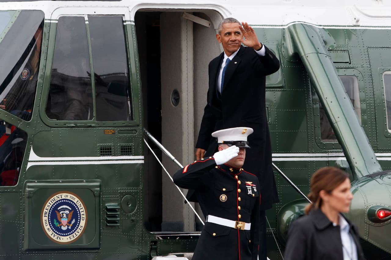 Former president Barack Obama waves as he departs the U.S. Capitol building, Friday, Jan. 20, 2017, in Washington, after Donald Trump was inaugurated. (AP Photo/Evan Vucci)