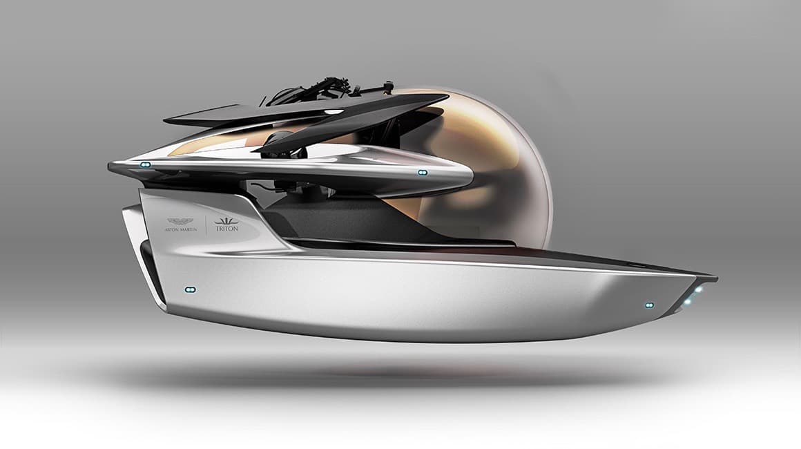 El Proyecto Neptuno hizo públicos el pasado miércoles imágenes del 
<b>diseño final</b> de su submarino, en el marco de la exhibición anual de embarcaciones de super lujo LYBRA que se está celebrando actualmente en la ciudad de Barcelona, en España. Aston Martin y Triton habían hecho pública su cooperación en pasado mes de septiembre pero hasta ahora nadie fuera del proyecto había visto el diseño. 
<br>
<br>La forma básica recuerda a la de una 
<b>lancha rápida</b>, pero la 
<b>enorme burbuja</b> que hace posible una vista expansiva de los alrededores de la embarcación, le da un toque de 
<b>vehículo espacial</b>. Las aletas estabilizadoras son simples y elegantes en franco contraste con el diseño de la parte superior del vehículo, poniendo de manifiesto la tensión creada entre el diseño y las necesidades del submarino.